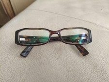 FCUK 74 tortoiseshell glasses.