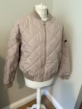 Womens cream bomber style padded jacket by Guess, size M (fits 10-12) great cond