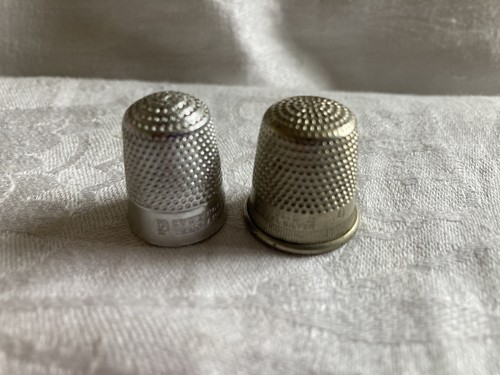 Two vintage thimbles one - ,