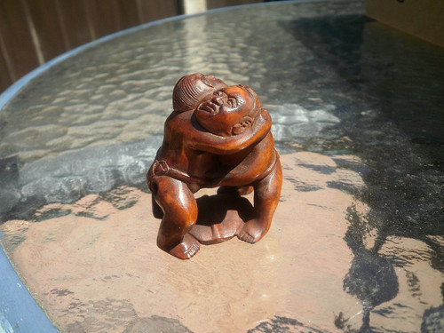 Hand carved wood netsuke sumo - hand,