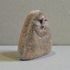 Stone OooF Face Sculpture