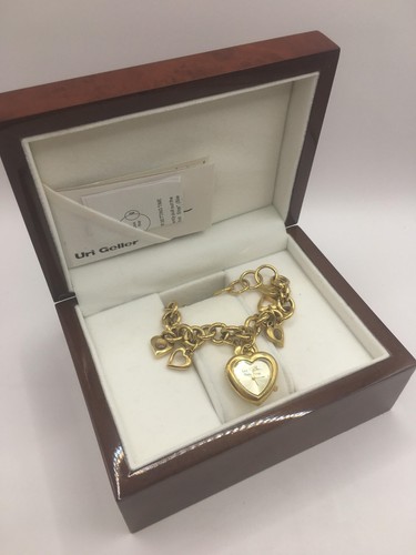 Uri geller gold tone chain - uri,