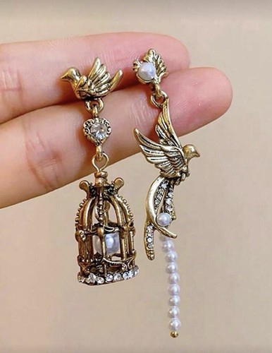 Vintage asymmetric bird cage - bird,