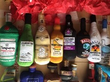 lucy sparrow felt art collection of 18 alcoholic drink bottles rum gin vodka etc