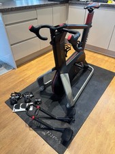Wattbike Atom V1 Indoor Smart Exercise Bike with Floor Mat and SPD-SL Pedals