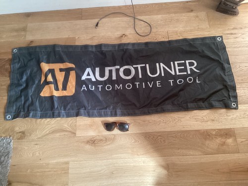 Autotuner garage banner man