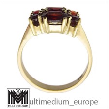 333 gold garnet ring faceted