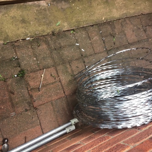 Razor wire 65m long - long, coiled