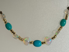 9CT GOLD FIRE OPAL AND ARIZONA TURQUOISE NECKLACE,  NATURAL STONES, STAMPED 375