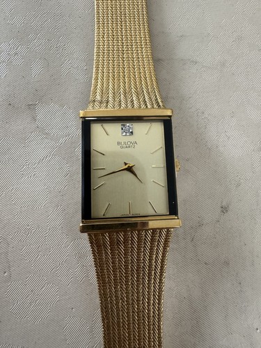 Vintage bulova gold - gold, quartz