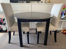 Ikea dining table with 2 chairs with removable covers