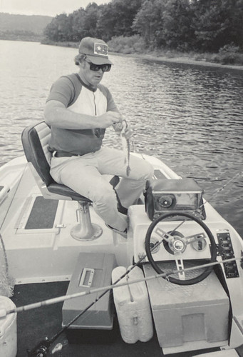 1970s man posing with caught - man,