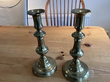 Antique pair of Georgian brass candlesticks round base C1820