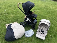 Nuna Mixx In 2 Colours Caviar Black And Biscotti + 2 Foot Aprons + BN Raincover