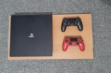 PlayStation 4 Pro 1TB 2 Controller and Games Headphones and Charging Dock Bundle