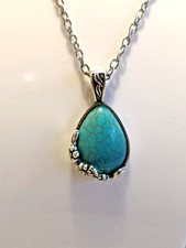 Necklace with oval Turquoise colour stone on a silver plated chain