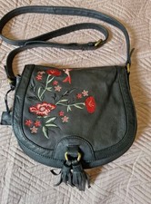 Louche Embroidered Leather saddle bag.