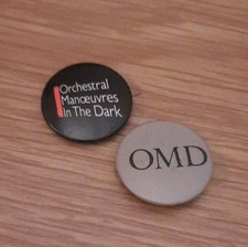 OMD.... Set Of Two Pin Badges.