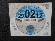 collectable road tax disc from 2012 with original sleeve for a Vauxhall~~