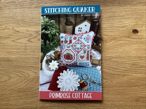 Stitching quaker cross - quaker,