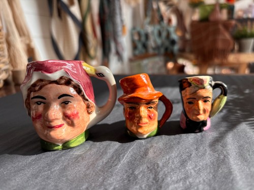 Three miniature toby - jugs,, two
