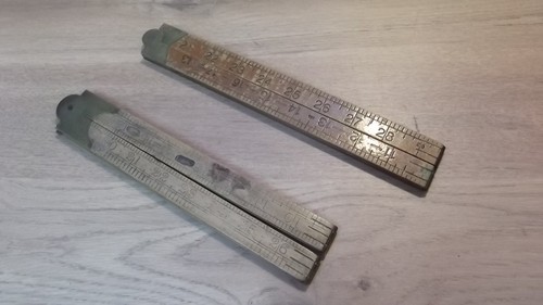 Two vintage folding rules - two,