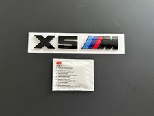 BMW X5M BADGE IN GLOSS BLACK. FREE ALCOHOL WIPE INCLUDED