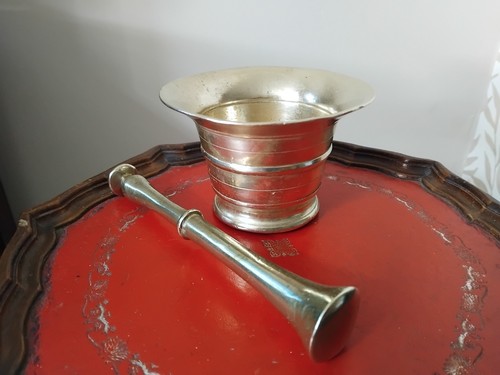 Brass pestle and - pestle,