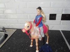 BARBIE ON A DANCING FUN  HORSE