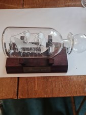 Glass Ship in a Bottle Hand