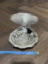 Vintage silver embossed metal