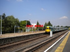 PHOTO  TATTENHAM CORNER STATION TWO OF SOUTHERN'S FLEET OF CLASS 455 ELECTRIC UN