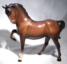 BESWICK HORSE  HEAD TUCKED LEG
