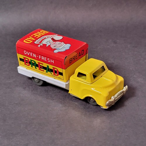 Vintage small tin friction - small,