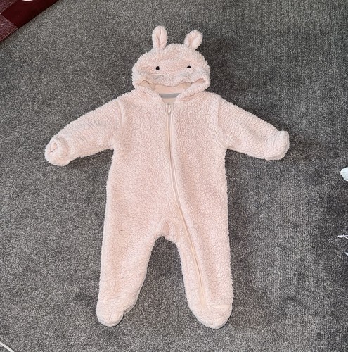 Pink snowsuit features - -,