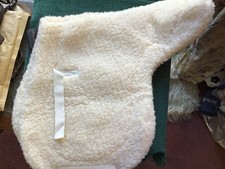 Synthetic fleece English shaped saddle pad seat 20” x 19 “ flap