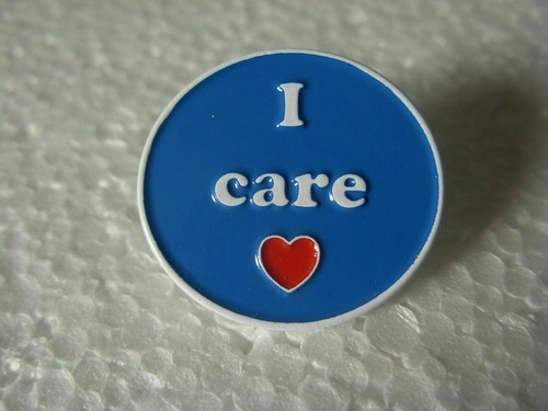 Care pin badge blue - care,