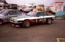 PHOTO  JAGUAR XJS OF TOM WALKINSHAW AND HANS HEYER SITS BESIDE JAMES WEAVER'S BM