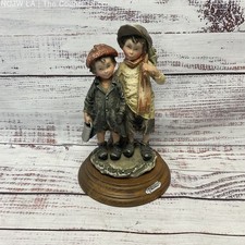 G. Armani 2 Boys Standing next