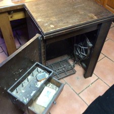 vintage singer treadle sewing machine in cabinet