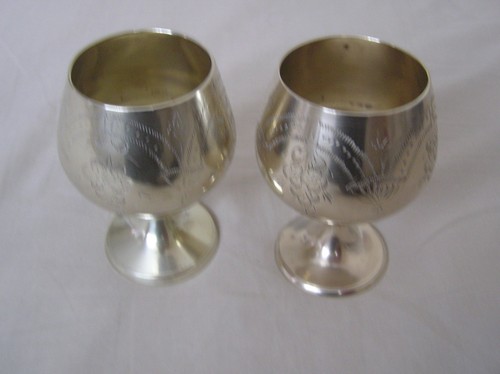Two vintage brass - goblets, with