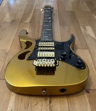 Chili Gold Electric Guitar With The Ultimate Support Carry Bag.