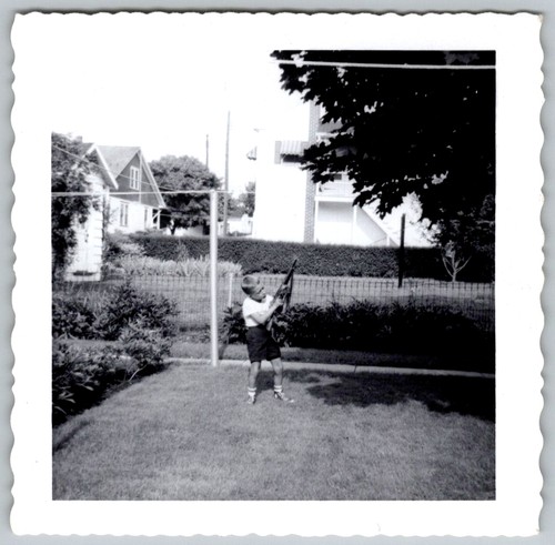 Vtg snapshot boy holding - vtg,