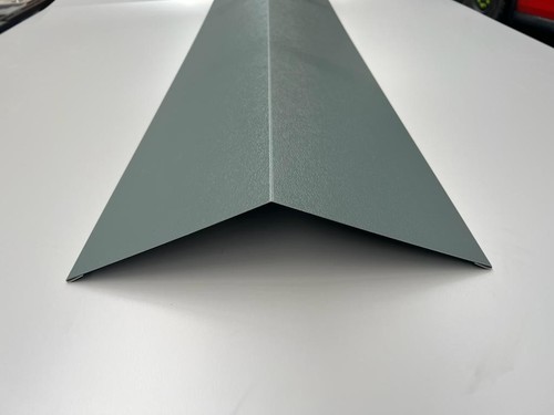 Ridge flashings for steel - -,