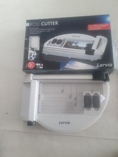 Roll cutter with integrated cold laminator for sealing photos cut up...