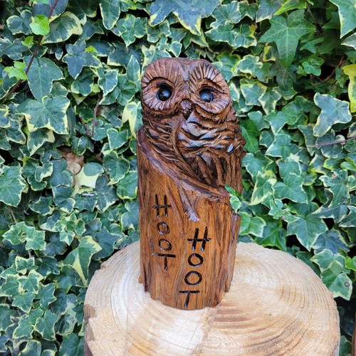 Chainsaw carved baby - owl, a