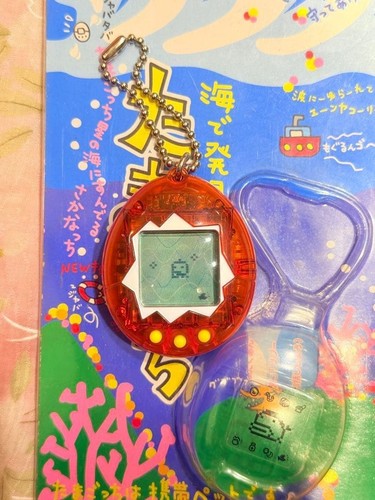 Tamagotchi ocean version clear - ocean,