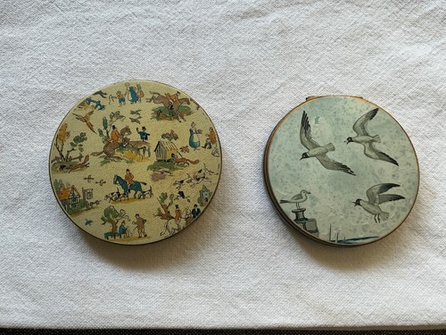 Two old compacts - two,