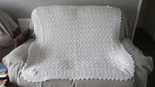 Hand knitted white squres - hand,