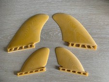 Futures fins quad setup, ( machado seaside template) foiled glass construction 